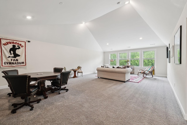 interior space with baseboards, recessed lighting, and lofted ceiling