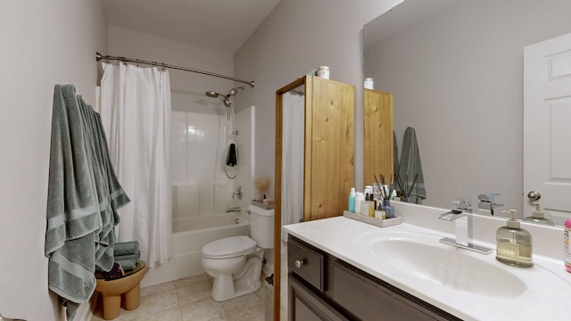 bathroom featuring tile patterned floors, toilet, vanity, and shower / bathtub combination with curtain