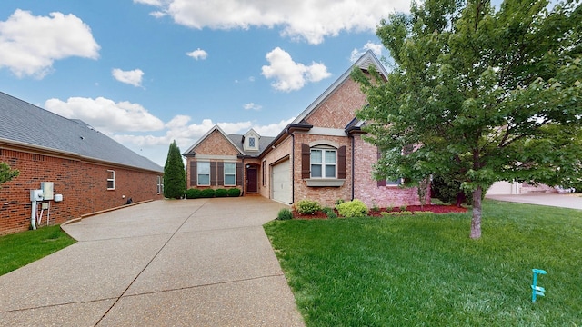 1740 Hartford Ln, Mount Juliet, TN 37122 - view of front of house featuring concrete driveway, brick siding, a garage, and a front yard
