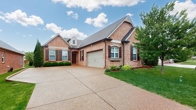 1740 Hartford Ln, Mount Juliet, TN 37122 - traditional-style home with brick siding, driveway, a garage, and a front yard