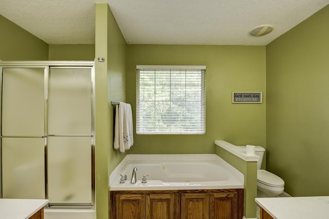 full bathroom featuring toilet, a shower stall, a bath, and vanity