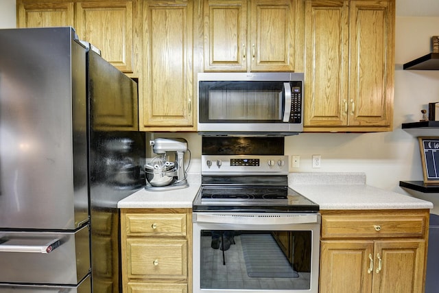 kitchen with light countertops and stainless steel appliances