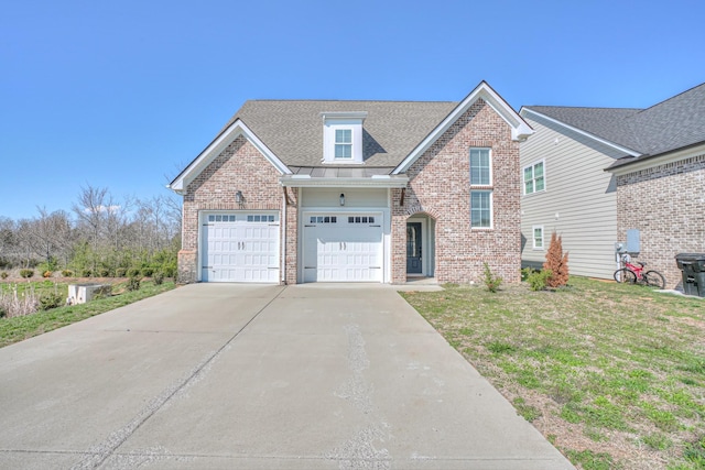 traditional-style home featuring concrete driveway, brick siding, and a front lawn