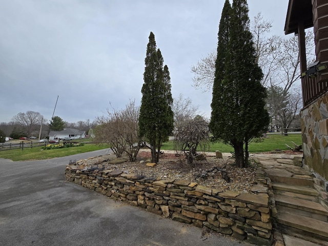 view of yard featuring fence