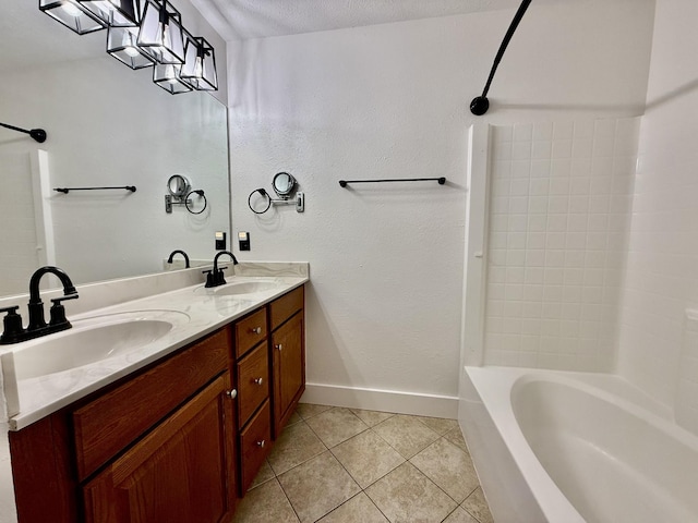 bathroom featuring a sink, tile patterned floors, baseboards, and shower / tub combination