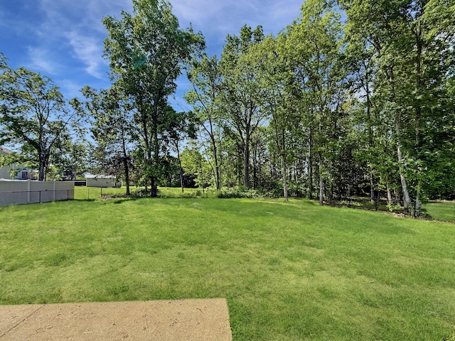 view of yard featuring fence