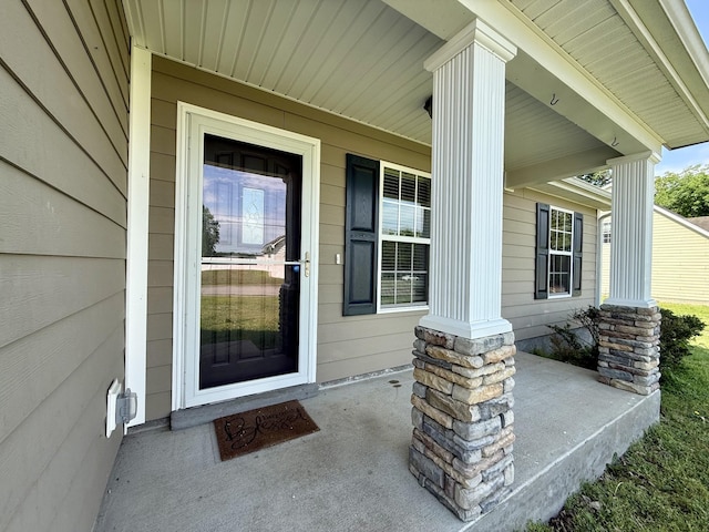 property entrance featuring covered porch