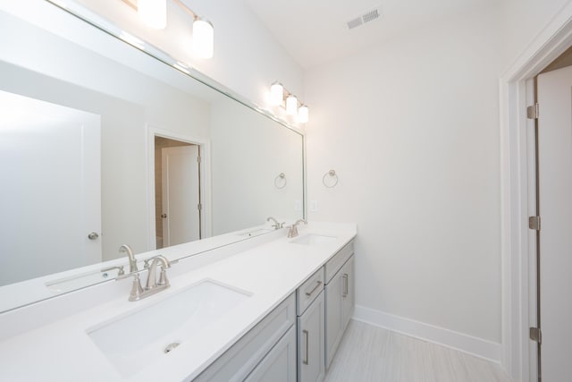 1052 Wetzel Dr, Franklin, TN 37064 - bathroom with baseboards and double vanity