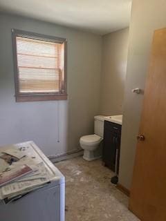 1708 Deer Hollow Dr, Lawrenceburg, TN 38464 - bathroom featuring vanity, toilet, and washer / clothes dryer