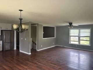 1708 Deer Hollow Dr, Lawrenceburg, TN 38464 - unfurnished living room with a chandelier, dark wood-type flooring, baseboards, and ceiling fan