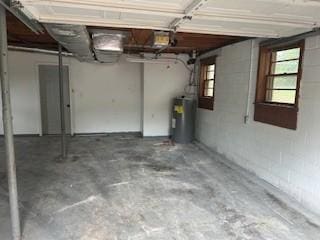 1708 Deer Hollow Dr, Lawrenceburg, TN 38464 - garage featuring electric water heater