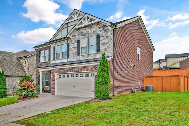 4284 Stone Hall Blvd, Hermitage, TN 37076 - view of front of house with a garage, a front lawn, aphalt driveway, fence, and brick siding