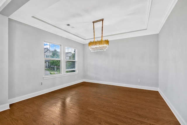 4284 Stone Hall Blvd, Hermitage, TN 37076 - empty room featuring crown molding, a raised ceiling, baseboards, dark wood-style floors, and a notable chandelier