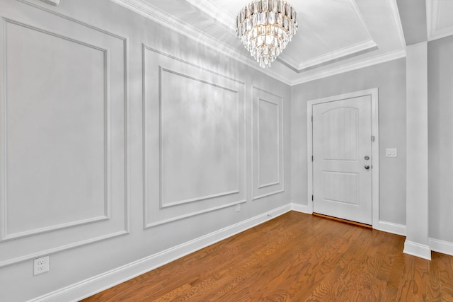4284 Stone Hall Blvd, Hermitage, TN 37076 - entryway featuring baseboards, dark wood finished floors, ornamental molding, and an inviting chandelier