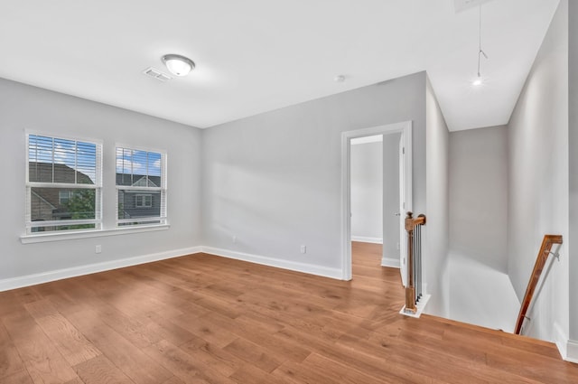 4284 Stone Hall Blvd, Hermitage, TN 37076 - unfurnished room with baseboards, wood finished floors, and visible vents