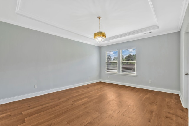4284 Stone Hall Blvd, Hermitage, TN 37076 - spare room with baseboards, ornamental molding, a tray ceiling, and wood finished floors