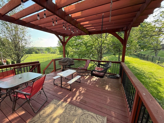 deck featuring a yard, a pergola, a fenced backyard, and outdoor dining space