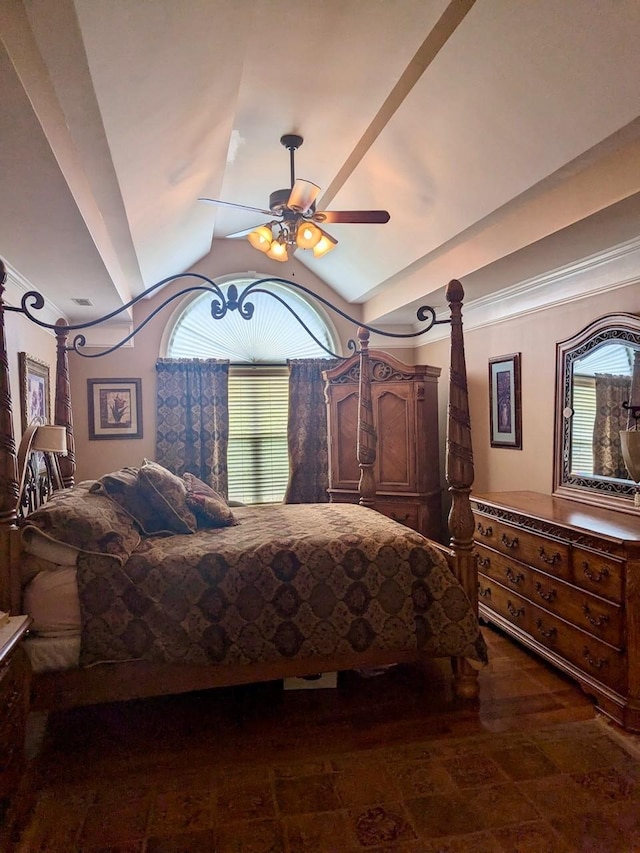 bedroom with a ceiling fan, wood finished floors, vaulted ceiling, and multiple windows