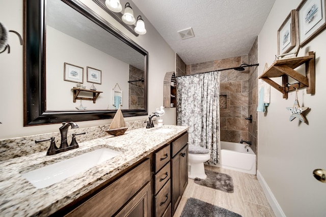 116 N Wynridge Way, Goodlettsville, TN 37072 - bathroom with toilet, shower / bath combination with curtain, double vanity, baseboards, and a textured ceiling