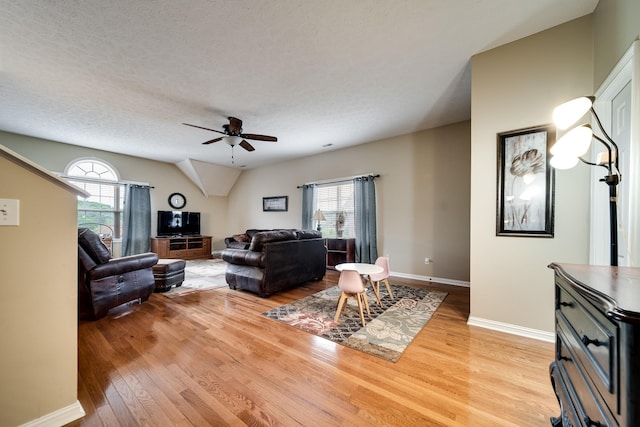 116 N Wynridge Way, Goodlettsville, TN 37072 - living room with a ceiling fan, light wood finished floors, baseboards, a textured ceiling, and vaulted ceiling