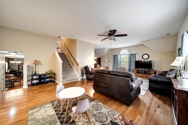 116 N Wynridge Way, Goodlettsville, TN 37072 - living area with stairway, a ceiling fan, light wood finished floors, a chandelier, and vaulted ceiling