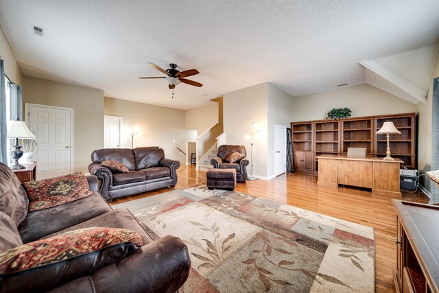 116 N Wynridge Way, Goodlettsville, TN 37072 - living area featuring light wood-style flooring, a ceiling fan, stairs, and baseboards