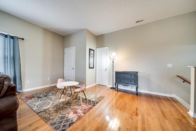116 N Wynridge Way, Goodlettsville, TN 37072 - living area with wood finished floors, baseboards, and an upstairs landing