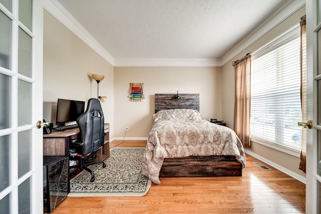 116 N Wynridge Way, Goodlettsville, TN 37072 - bedroom featuring ornamental molding, wood finished floors, a textured ceiling, baseboards, and an office area