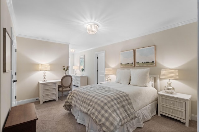bedroom with crown molding, baseboards, and carpet flooring