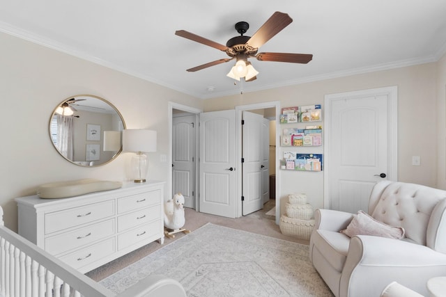 bedroom featuring ornamental molding, light carpet, and ceiling fan