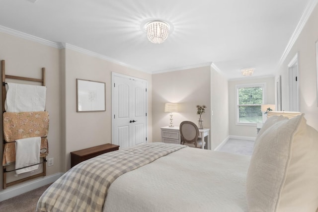carpeted bedroom with crown molding, baseboards, and an inviting chandelier