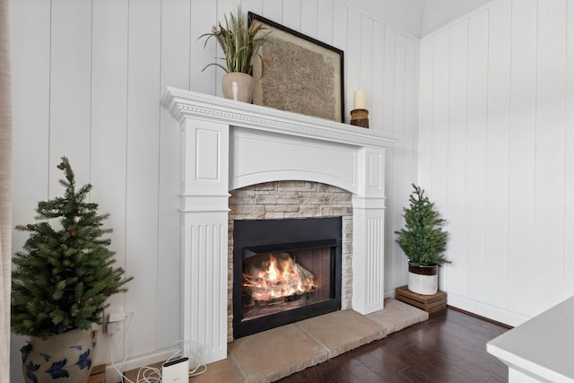 room details featuring wood finished floors and a fireplace