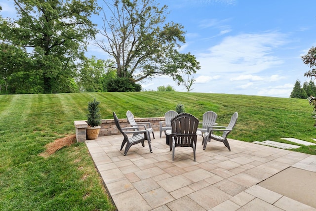 view of patio / terrace featuring a fire pit
