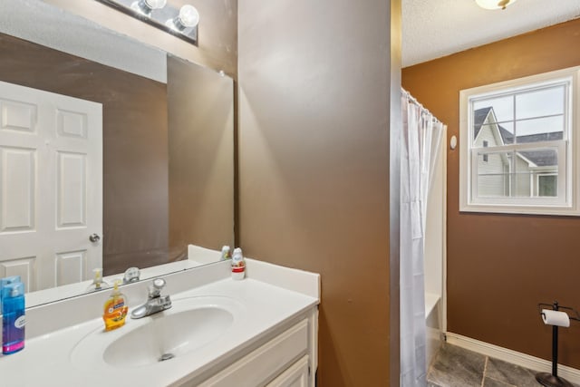 full bathroom featuring tile patterned flooring and vanity
