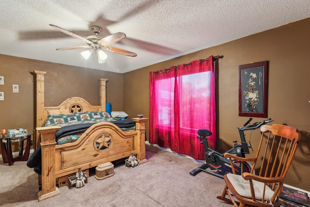 bedroom with carpet floors, a textured ceiling, and ceiling fan