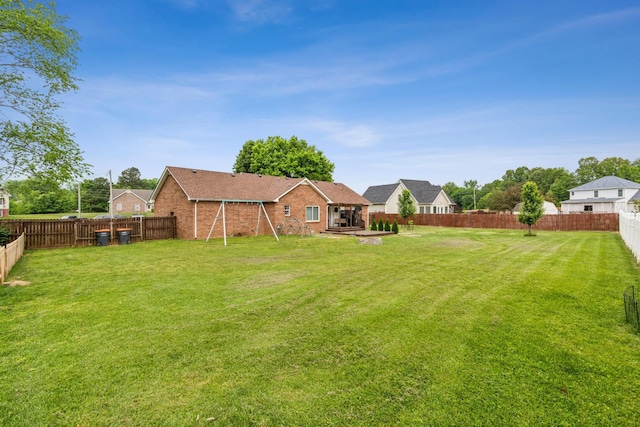 view of yard featuring a fenced backyard