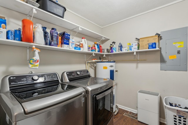 laundry area featuring electric panel, laundry area, dark wood-style floors, water heater, and washer and dryer