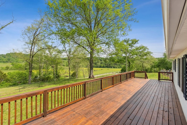 wooden deck with a yard