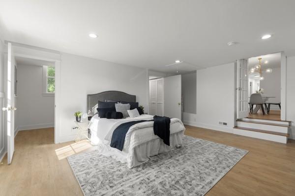 bedroom with recessed lighting, baseboards, and light wood-style flooring