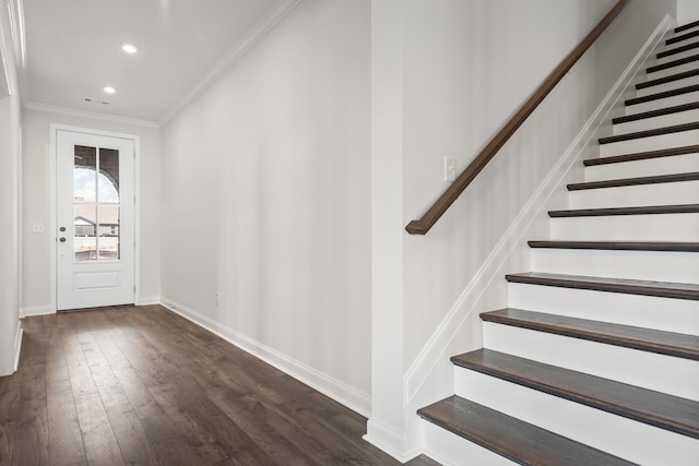 foyer featuring stairway, baseboards, dark wood-style floors, ornamental molding, and recessed lighting