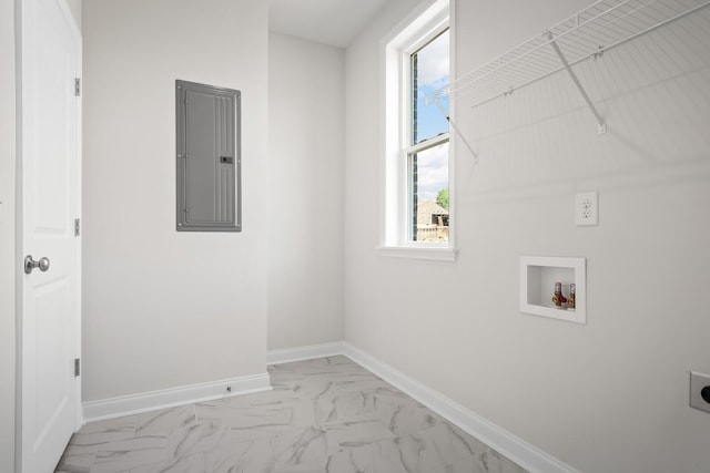 washroom with laundry area, hookup for an electric dryer, marble finish floor, and electric panel