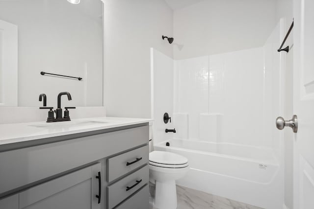 full bathroom featuring vanity, shower / bathing tub combination, toilet, and marble finish floor