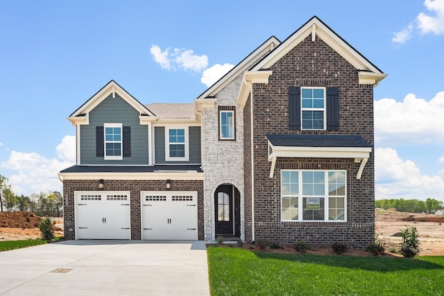 craftsman house featuring concrete driveway, brick siding, an attached garage, and a front lawn