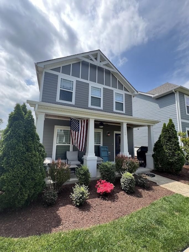 craftsman-style home featuring covered porch
