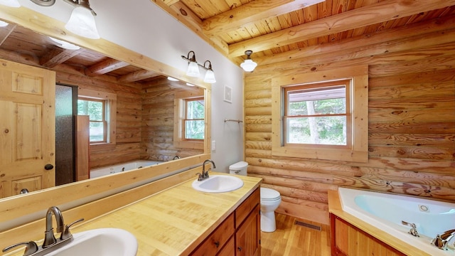 full bathroom with a sink, wood ceiling, and beamed ceiling
