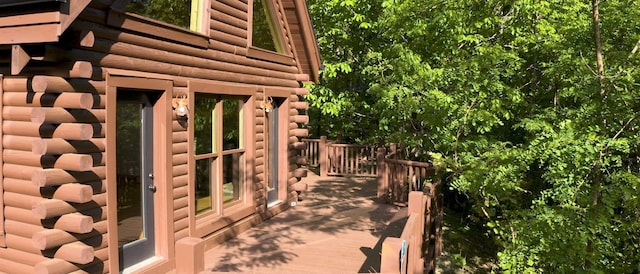 view of side of property with log exterior
