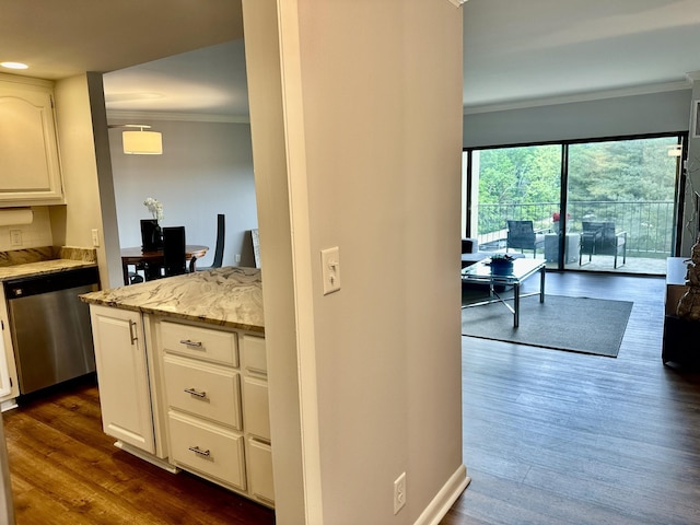 kitchen with crown molding, dark wood-type flooring, dishwasher, and white cabinets