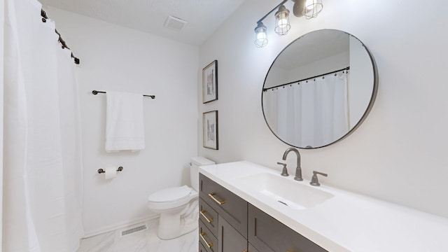full bath featuring vanity, baseboards, toilet, and visible vents