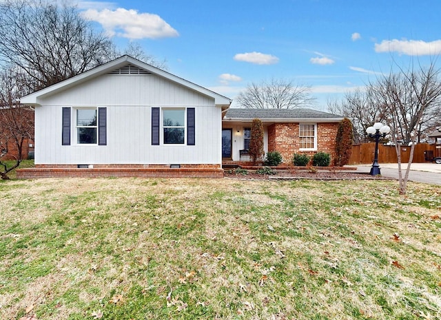 single story home featuring covered porch, crawl space, fence, and a front lawn