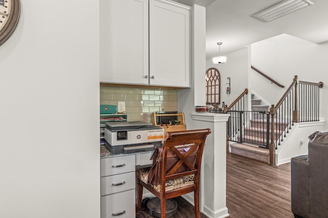 home office featuring visible vents and dark wood-style floors